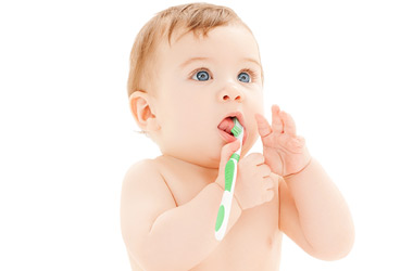 baby brushing teeth