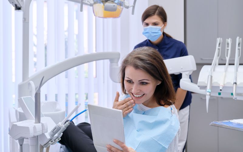 woman looking at her smile